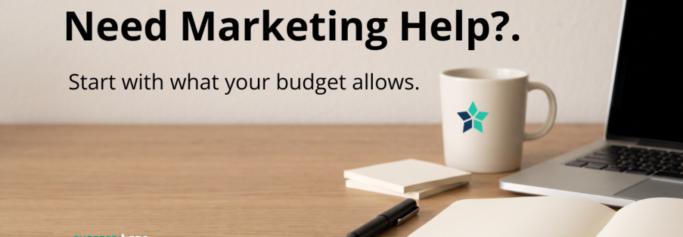 Small business owner planning marketing at a desk beside the words “Need Marketing Help? Start with what your budget allows.”